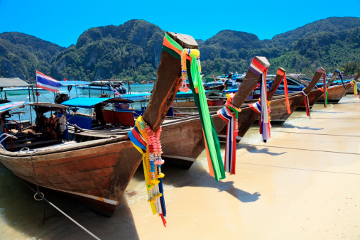 Long tail wooden boats at the beach-Phi Phi Island-Thailand