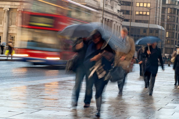 istock Commuters in the Rain in London with movement blur 168260852