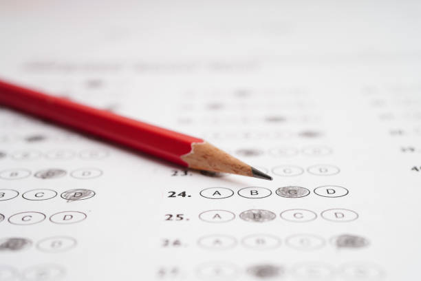 istock Answer sheets with pencil drawing fill to select choice, education concept. 1682611166
