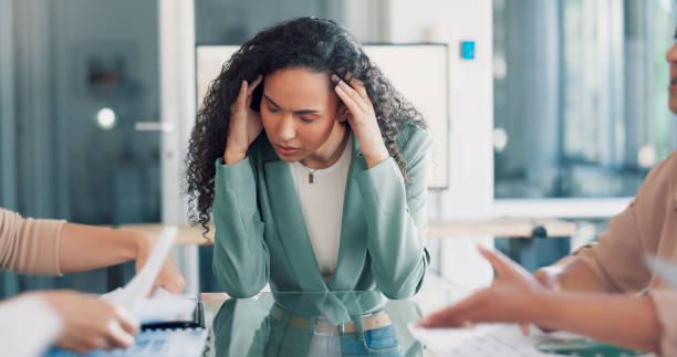 istock Manager, stress and woman with a headache, multitasking or burnout with chaos, overworked or frustrated. Female person, employee or consultant with a migraine, workflow crisis or mistake in an office 1682615965