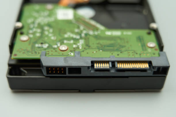 istock The SATA connector of a hard disk drive, gray background 1682619865