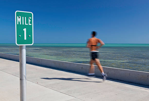 Running Man running in the mile one at key west RUNNING A MILE stock pictures, royalty-free photos & images