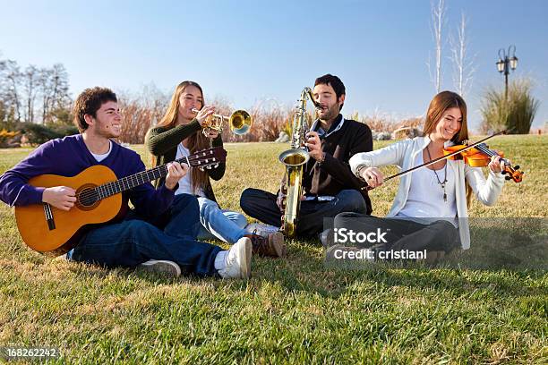 Teamwork Stock Photo - Download Image Now - Orchestra, Young Adult, Multiracial Group