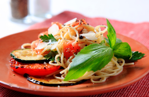 Spaghetti with baked tomato, zucchini and aubergine