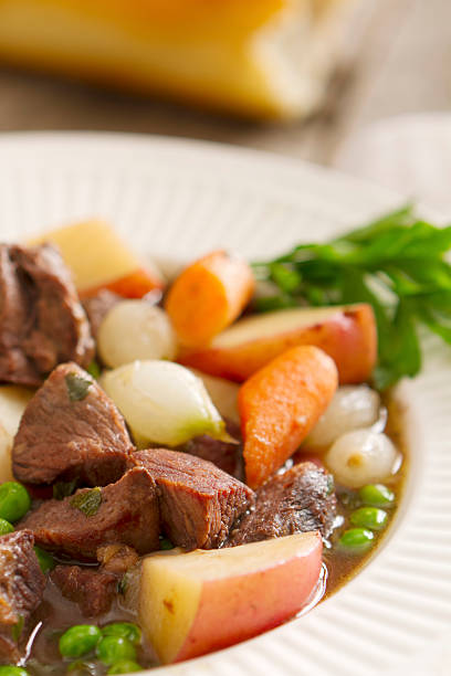 A hearty meat and vegetable stew made with meat, potatoes, peas, carrots, and pearl onions. Served with crusty french bread.