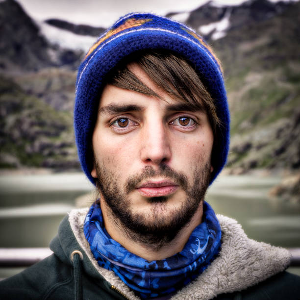 Bearded young man Portrait of bearded young man. On the background mountains and snow. HDR image. high dynamic range imaging photos stock pictures, royalty-free photos & images