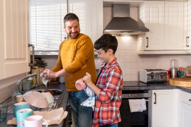 istock Helping Each Other in The Kitchen 1682626386