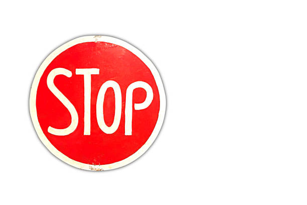 istock Red stop sign vintage for traffic control isolated on white background. 1682630800