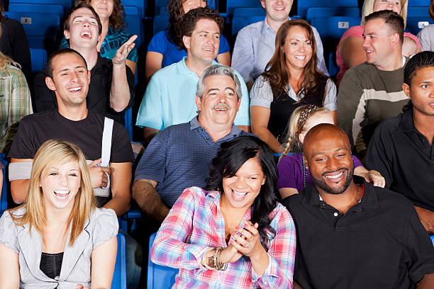 istock Diverse large group of people watching an exciting game 168263145