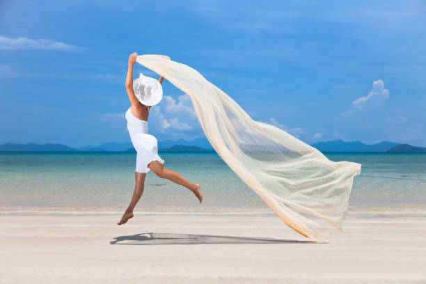 istock Happy woman on the beach 168263353