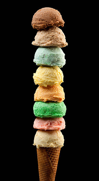 Eight scoops of ice creams with cone on Black Background Huge Eight scoops ice creams with cone on Black Background. vanilla ice cream photos stock pictures, royalty-free photos & images