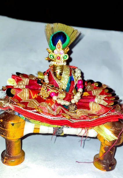 istock Lord Krishna also known as laddu gopal sculpture in beautiful clothes selective focus 1682636209