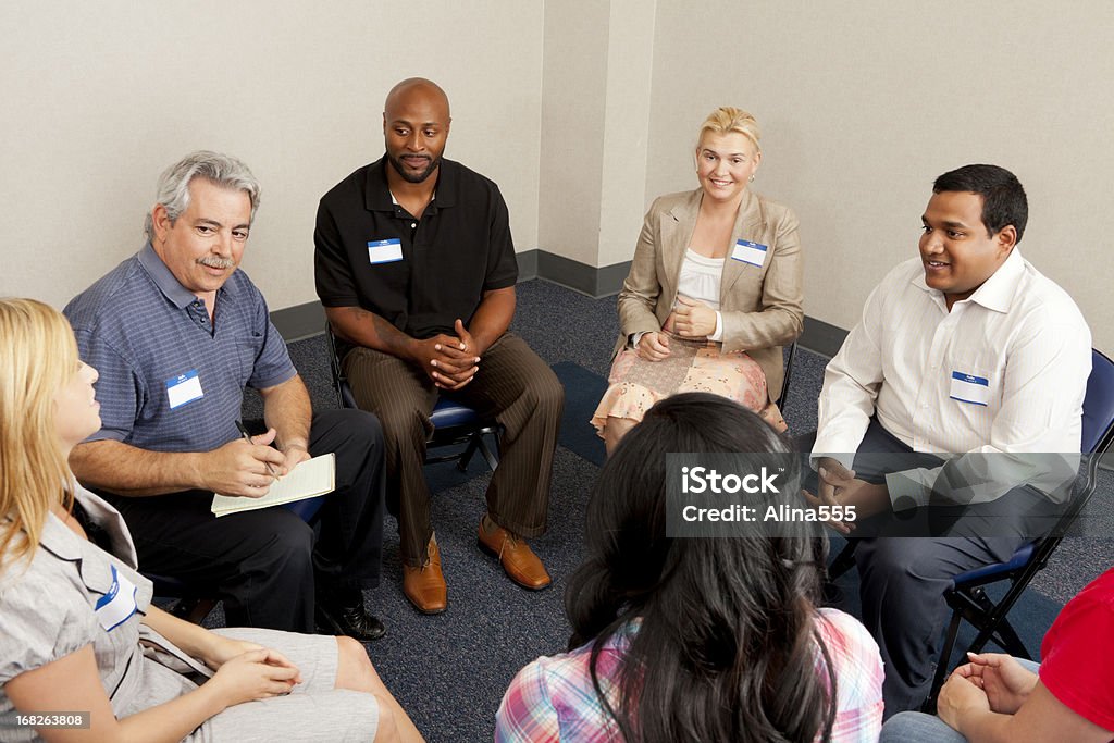 Team Diskussion - Lizenzfrei Sozialarbeiter Stock-Foto