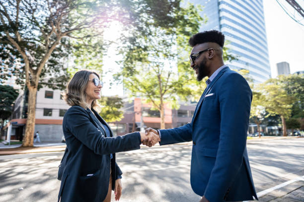 istock Business people greeting outdoors 1682638426