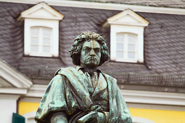 Ludwig van Beethoven Statue of Ludwig van Beethoven in Bonn. Designed by Ernst Hähnel and made Jacob Daniel Burgschmiet in 1845. It is located at square Münsterplatz in Bonn. ludwig van beethoven stock pictures, royalty-free photos & images