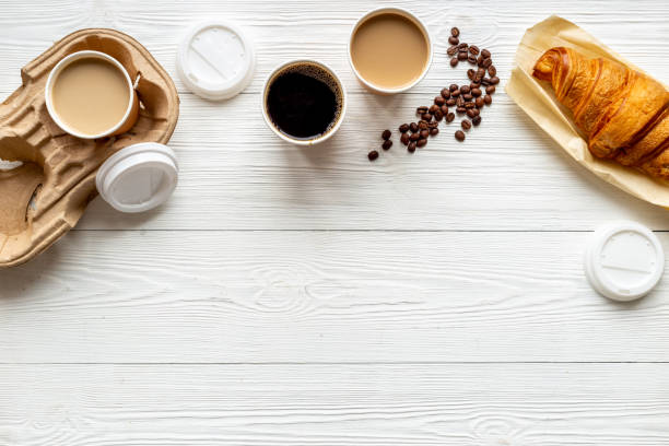 istock Different types of coffee in paper cup with croissant 1682646259