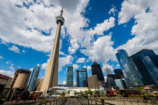 Toronto, Canada - August 31, 2022: view from a railroad track to CN Tower and some skyscraper at Toronto downtown