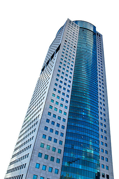Skyscraper with glass windows on a gray sky