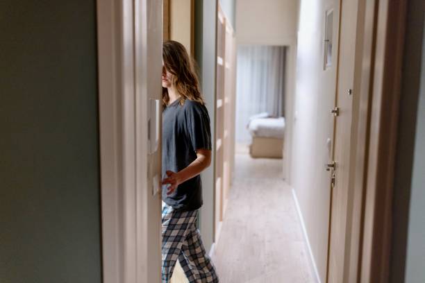istock Lovely woman in pyjamas preparing for bed 1682663096