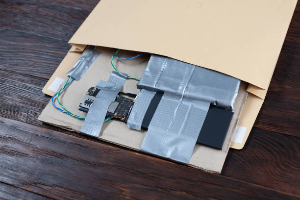 istock Mail bomb IED - Improvised Explosive Device with c4 and cell phone module in envelope 1682668706