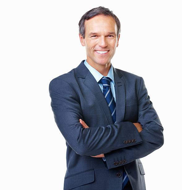 istock Smiling executive with arms crossed 168266874