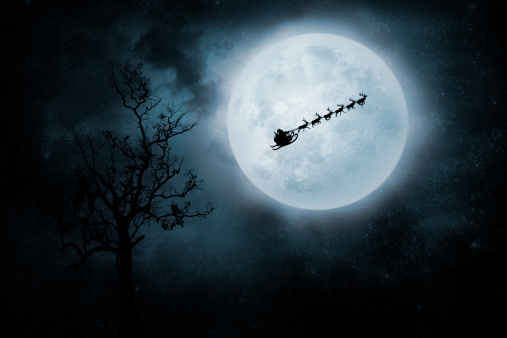 Santa flies to deliver gifts. On night sky background