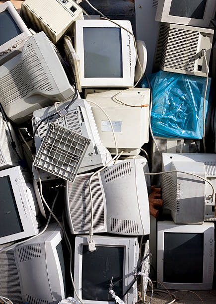 old computer monitors in street