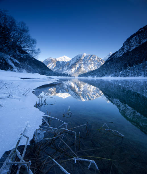 winter at lake plansee in tirol - austria