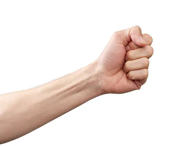 Photo of Arm and fist against white background