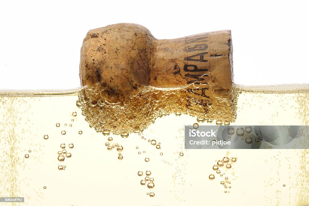 Schwimmende Champagner cork in Flöte - Lizenzfrei Schaumwein Stock-Foto