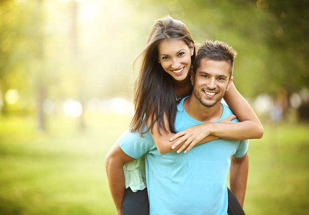 Happy couple in park.