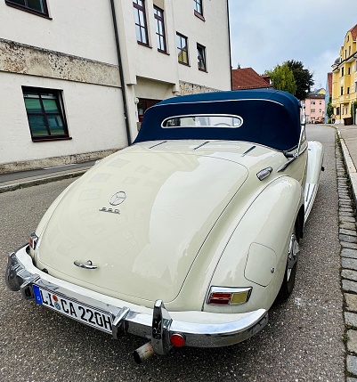 Augsburg, Germany - September 15th - 2023: Mercedes Benz  Oldtimer 220 Cabrio parked on a public street.