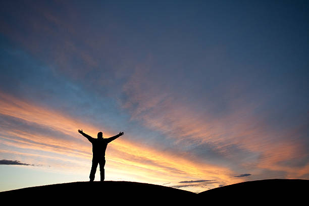 istock Silhouette of a Man with Arms Raised 168269627