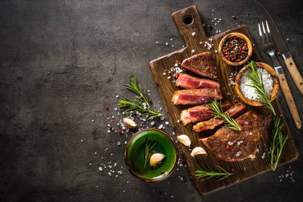 istock Grilled beef steak with herbs. 1682702366
