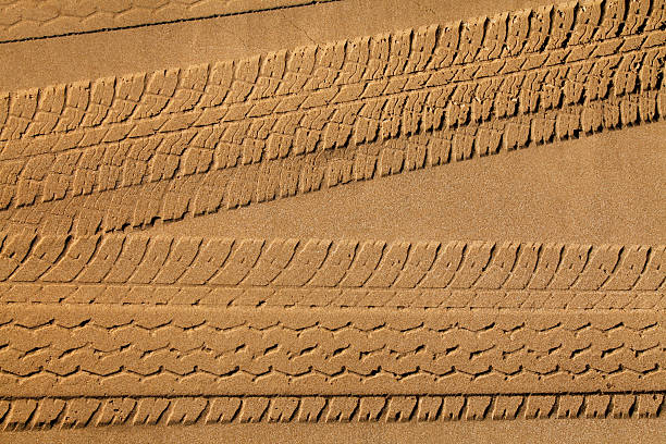 Tyre Tracks in Sand stock photo