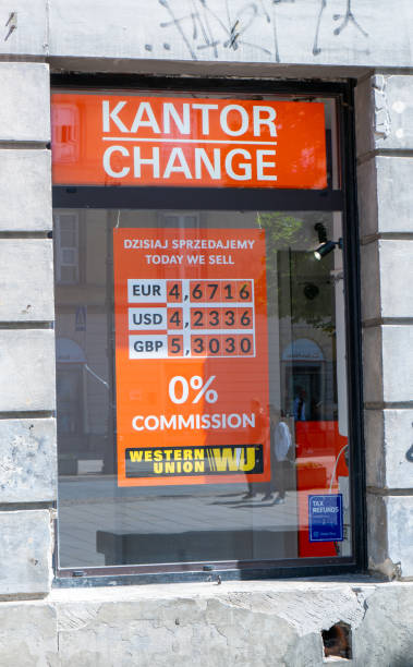 Currency exchange in the Polish exchange office. Signboard on the street, banner. The exchange rate of foreign currencies. Warsaw, Poland - July 27, 2023. Polish change money office. Signboard on the street, Kantor red banner. The exchange rate of foreign currencies. Word kantor in Polish language - currency exchange. Warsaw, Poland - July 27, 2023. kantor stock pictures, royalty-free photos & images