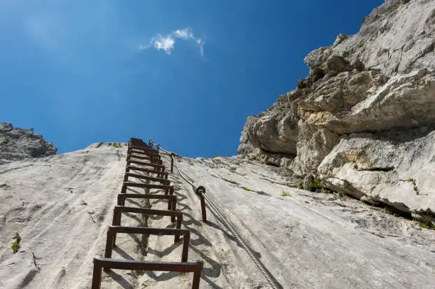Via ferrata climbing ladder in the Alps