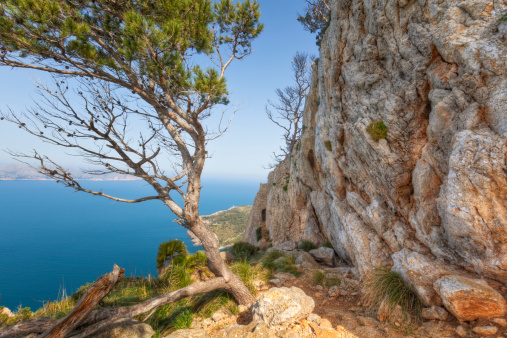 Penya Roja or Penya des Migdia or Red Rock, north-east coast of the Balearic island of Majorca