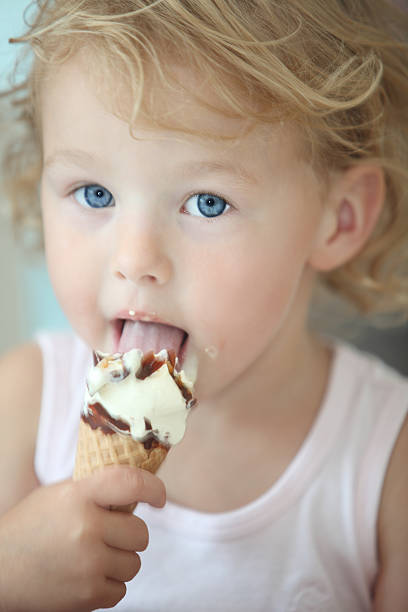 istock Girl and ice cream cone 168274349