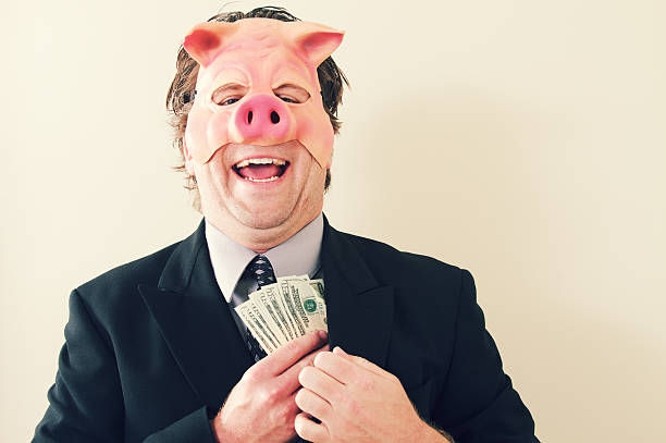 бизнес человек свинья денег - greed currency men happiness стоковые фото и изображения