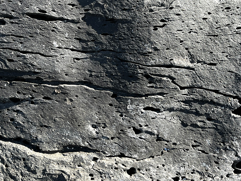 detail of volcanic rock from eruption with small holes