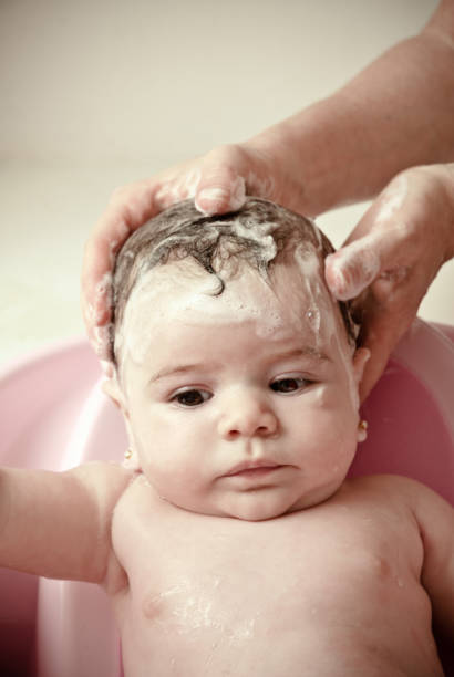 istock Baby girl take a bath 168275595