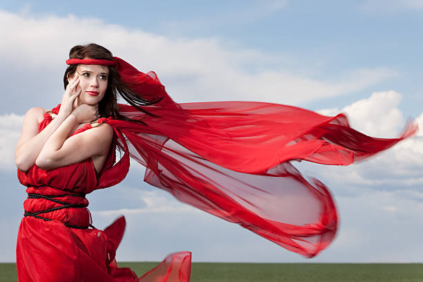 istock Woman Wearing Red Outdoors in Wind 168276505