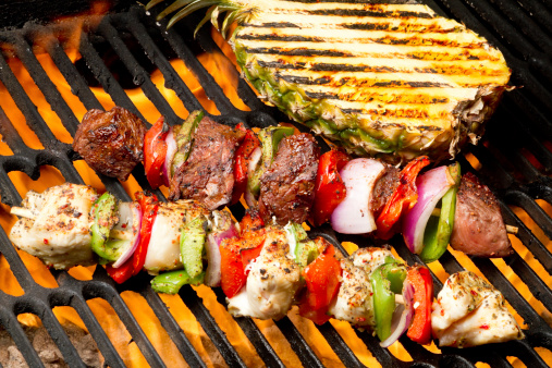 Chicken Shish Kebabs with bell pepper and grilled chicken breast and beef and onion with grilled pineapple