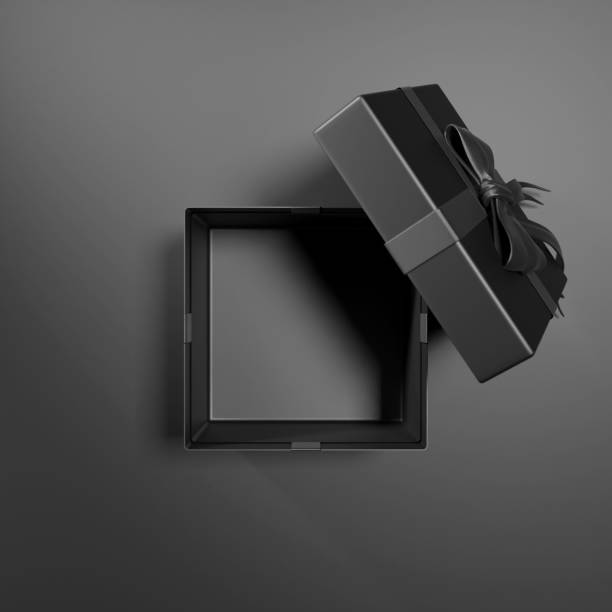 istock Top view of  open gift box or present box with red ribbon and bow  on black background with shadow 1682774110