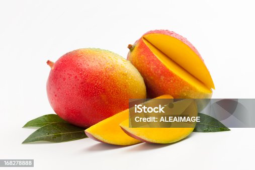 istock Fresh Slices of Mango on a Bed of Leaves 168278888