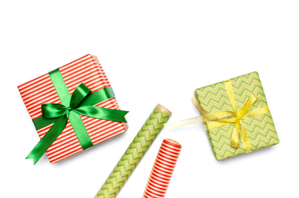 istock Gift boxes, packing paper, scissors, ribbon on white background. Festive background, congratulation, gift wrapping, Christmas and new year theme. Flat lay, top view, copy space. 1682794772