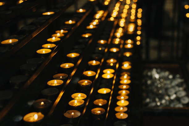 istock Burning candles in an old church. 1682809246