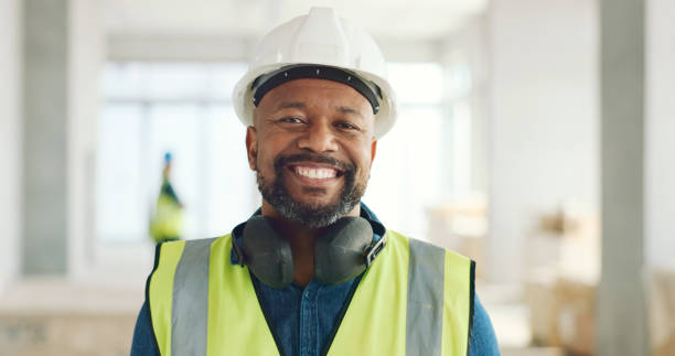 istock Happy black man, portrait or construction engineer, industrial manager and pride in architecture, renovation or innovation. African architect, safety PPE or project management of property development 1682817105