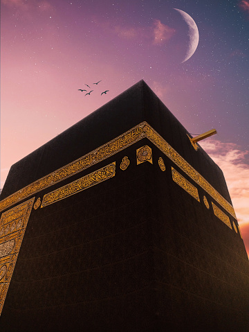 The black building of the kaaba in mecca. Kaaba with moon. Mecca,Saudi Arabia.